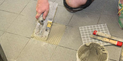 Regrouting of tile floor